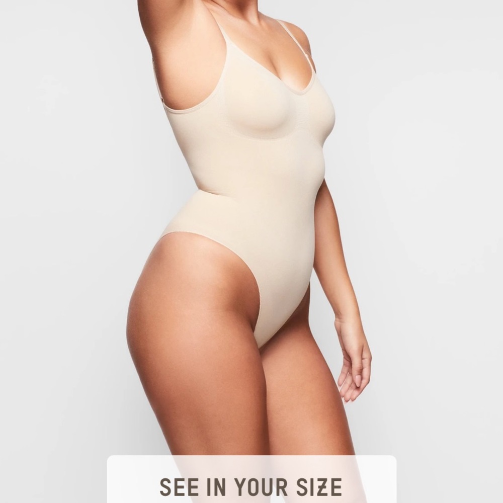 Skins body suit full coverage